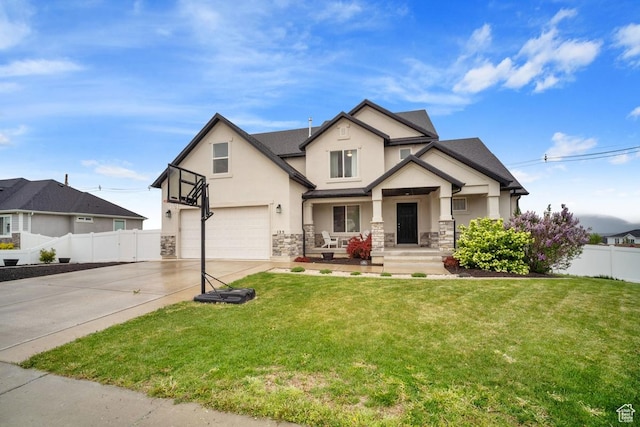 craftsman-style home with stone siding, an attached garage, stucco siding, fence, and driveway