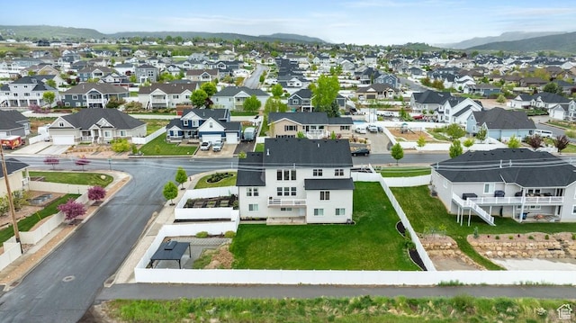 bird's eye view with a residential view and a mountain view