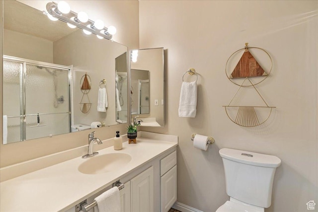 2568 S Elizabeth St Unit 5, Salt Lake City, UT 84106 - full bathroom with a stall shower, vanity, and toilet