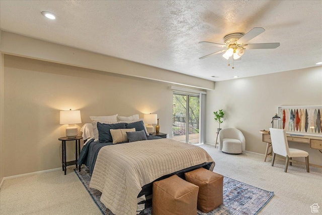 2568 S Elizabeth St Unit 5, Salt Lake City, UT 84106 - bedroom featuring baseboards, light carpet, a textured ceiling, and access to exterior
