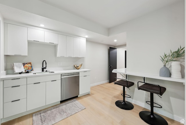 3520 S Westwood Dr E, Millcreek, UT 84109 - kitchen featuring recessed lighting, stainless steel dishwasher, baseboards, a sink, and white cabinetry
