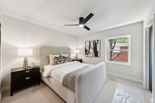 3520 S Westwood Dr E, Millcreek, UT 84109 - bedroom with light carpet, baseboards, and a ceiling fan