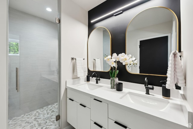 3520 S Westwood Dr E, Millcreek, UT 84109 - bathroom with a shower stall, recessed lighting, double vanity, and a sink
