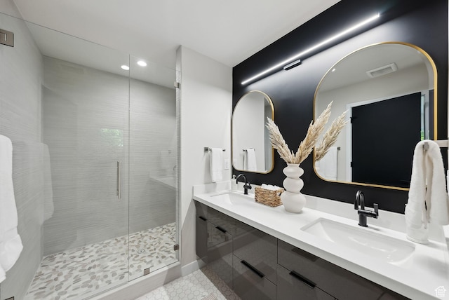 3520 S Westwood Dr E, Millcreek, UT 84109 - bathroom with a stall shower, tile patterned floors, recessed lighting, and a sink