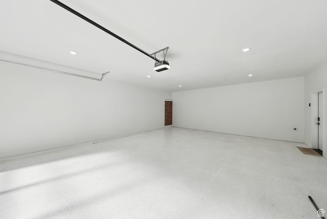 3520 S Westwood Dr E, Millcreek, UT 84109 - garage with a garage door opener and recessed lighting