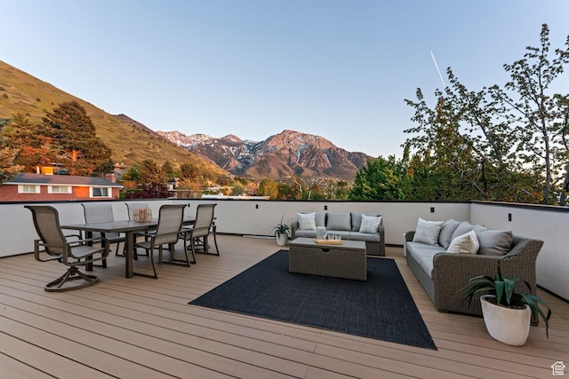 3520 S Westwood Dr E, Millcreek, UT 84109 - wooden deck featuring an outdoor living space, outdoor dining space, and a mountain view