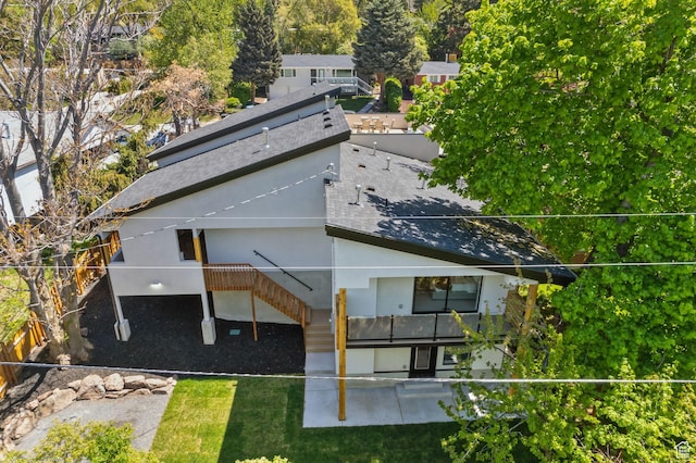 3520 S Westwood Dr E, Millcreek, UT 84109 - rear view of property with stairs, a patio area, stucco siding, and roof with shingles
