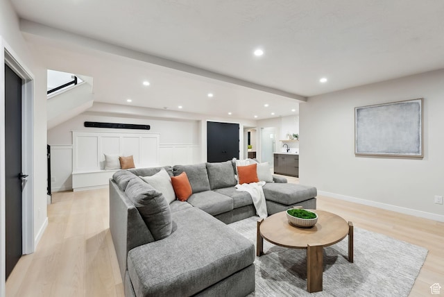 3520 S Westwood Dr E, Millcreek, UT 84109 - living area with light wood finished floors, baseboards, and recessed lighting