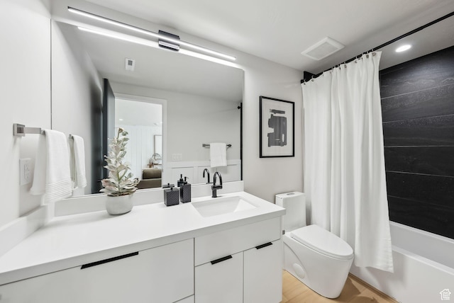 3520 S Westwood Dr E, Millcreek, UT 84109 - full bathroom featuring toilet, shower / tub combo, visible vents, vanity, and recessed lighting