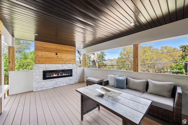 3520 S Westwood Dr E, Millcreek, UT 84109 - wooden terrace featuring an outdoor living space with a fireplace