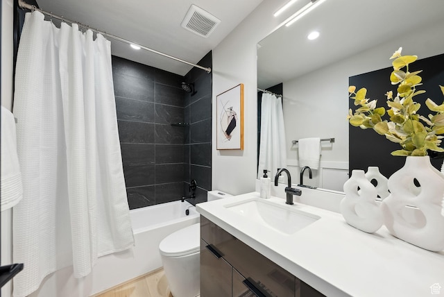 3520 S Westwood Dr E, Millcreek, UT 84109 - full bathroom with toilet, shower / bath combo, visible vents, vanity, and recessed lighting