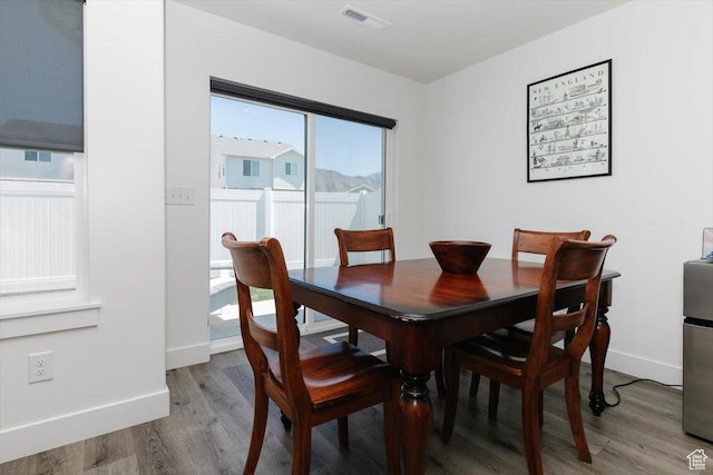 2396 N 150 E, North Logan, UT 84341 - dining area featuring baseboards, visible vents, and wood finished floors