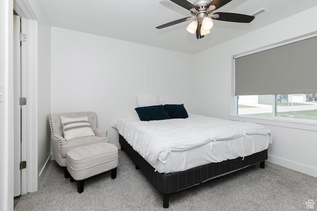 2396 N 150 E, North Logan, UT 84341 - carpeted bedroom with baseboards, visible vents, and a ceiling fan