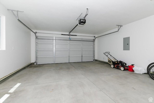 2396 N 150 E, North Logan, UT 84341 - garage featuring electric panel and a garage door opener
