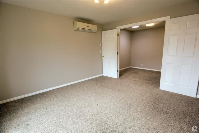 571 N 200 W, Bountiful, UT 84010 - carpeted empty room featuring baseboards and a wall unit AC