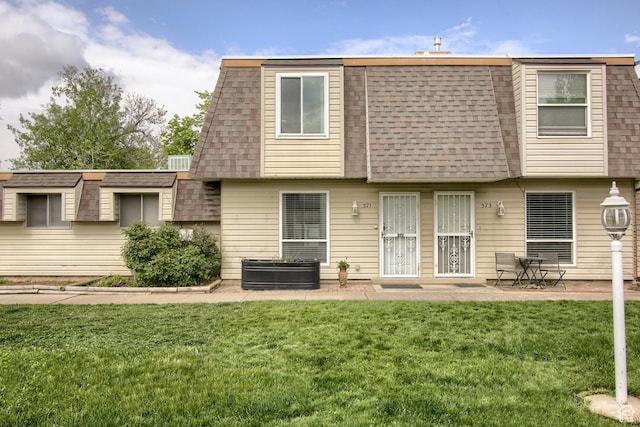 571 N 200 W, Bountiful, UT 84010 - back of house with roof with shingles, mansard roof, a yard, and a patio area