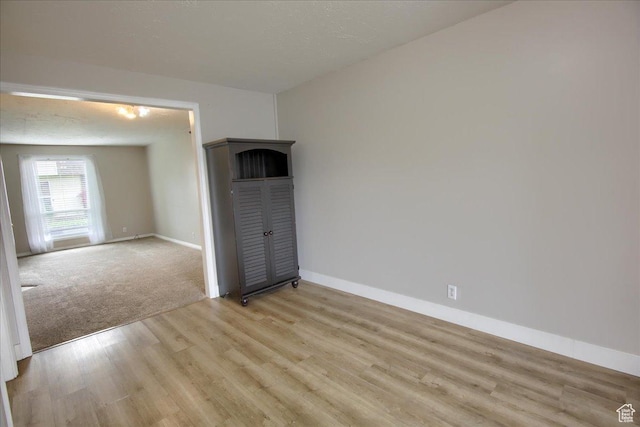 571 N 200 W, Bountiful, UT 84010 - empty room with light wood-style flooring and baseboards