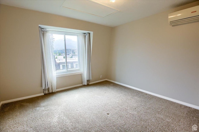 571 N 200 W, Bountiful, UT 84010 - spare room featuring carpet flooring, a wall mounted air conditioner, and baseboards
