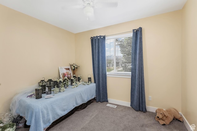 4999 W Tobago Ln, Herriman, UT 84096 - carpeted bedroom with baseboards, a ceiling fan, and visible vents