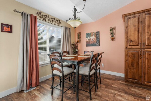 4999 W Tobago Ln, Herriman, UT 84096 - dining room with baseboards, dark wood finished floors, visible vents, and vaulted ceiling