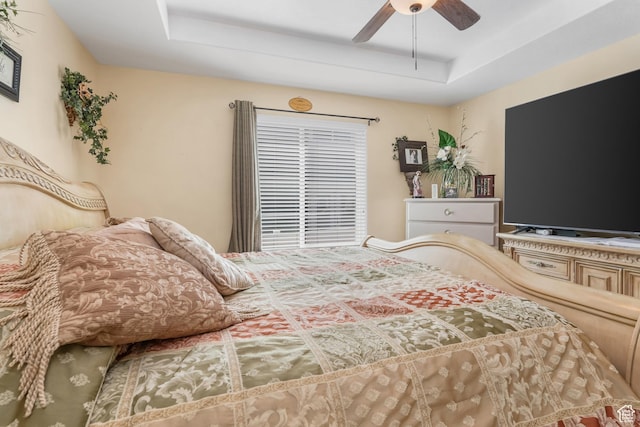4999 W Tobago Ln, Herriman, UT 84096 - bedroom with a tray ceiling and a ceiling fan