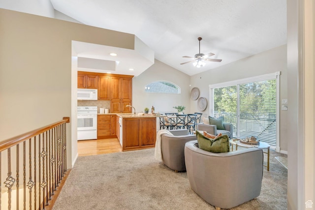 12532 S Blacksmith Ln, Draper, UT 84020 - living room with lofted ceiling, light colored carpet, and a ceiling fan