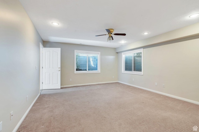 12532 S Blacksmith Ln, Draper, UT 84020 - unfurnished room with light colored carpet, baseboards, ceiling fan, and recessed lighting