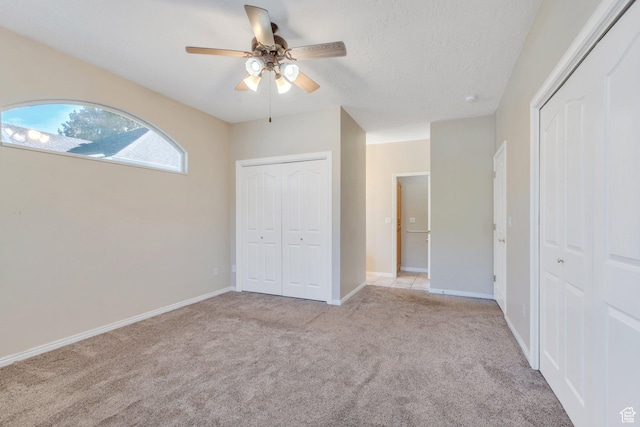 12532 S Blacksmith Ln, Draper, UT 84020 - unfurnished bedroom with ceiling fan, light carpet, and baseboards
