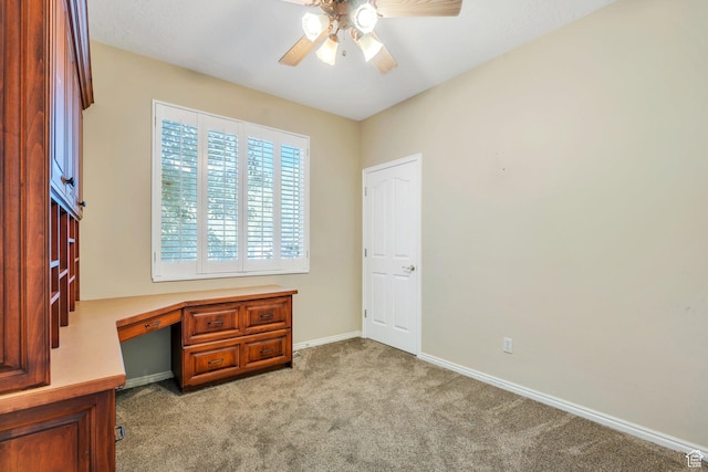 12532 S Blacksmith Ln, Draper, UT 84020 - bedroom featuring built in desk, light carpet, baseboards, and a ceiling fan