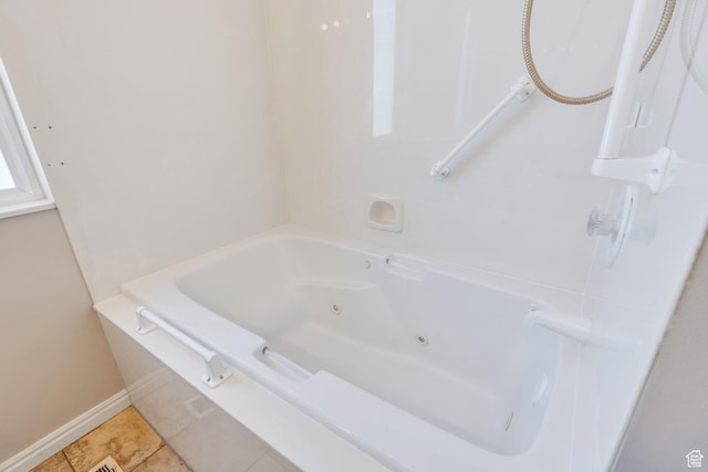 12532 S Blacksmith Ln, Draper, UT 84020 - bathroom with tile patterned floors, a shower, baseboards, and a jetted tub