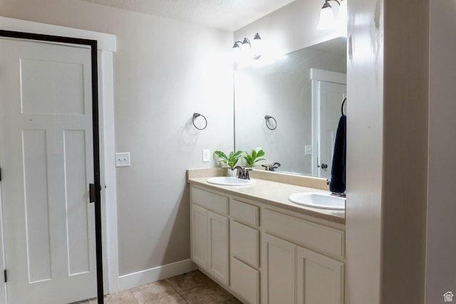 954 S 2040 W, Orem, UT 84059 - bathroom featuring double vanity and tile patterned floors