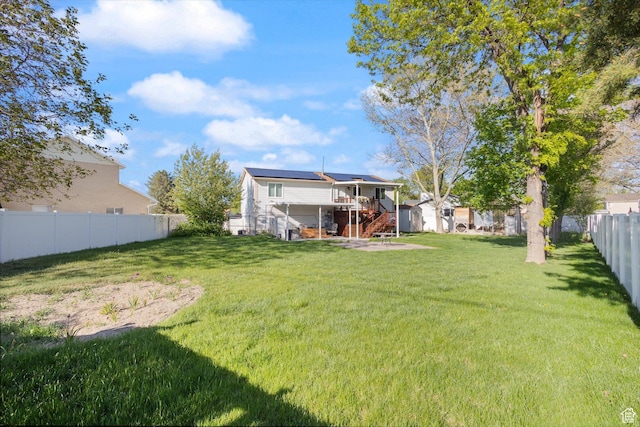 4990 S Hensley Cir, Taylorsville, UT 84129 - view of yard featuring a fenced backyard, a storage shed, and an outbuilding