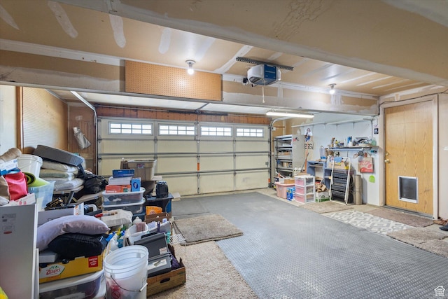 4990 S Hensley Cir, Taylorsville, UT 84129 - garage featuring a garage door opener