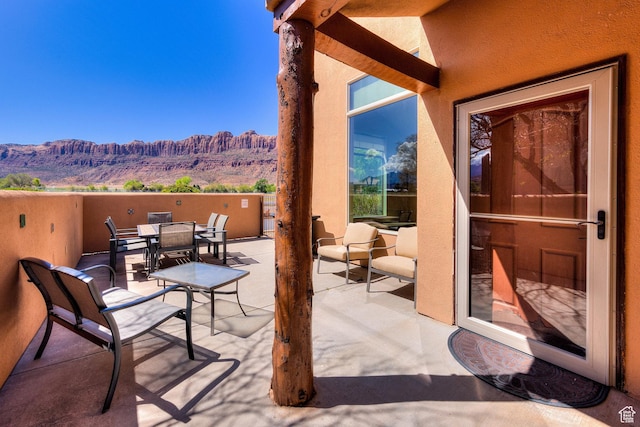 3686 S Spanish Valley Dr Unit K-2, Moab, UT 84532 - view of patio / terrace with a mountain view