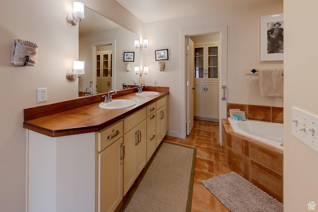 3686 S Spanish Valley Dr Unit K-2, Moab, UT 84532 - bathroom featuring a sink, tile patterned flooring, double vanity, and a garden tub