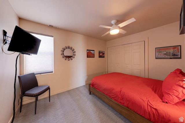 3686 S Spanish Valley Dr Unit K-2, Moab, UT 84532 - bedroom with carpet flooring, a ceiling fan, a closet, visible vents, and baseboards