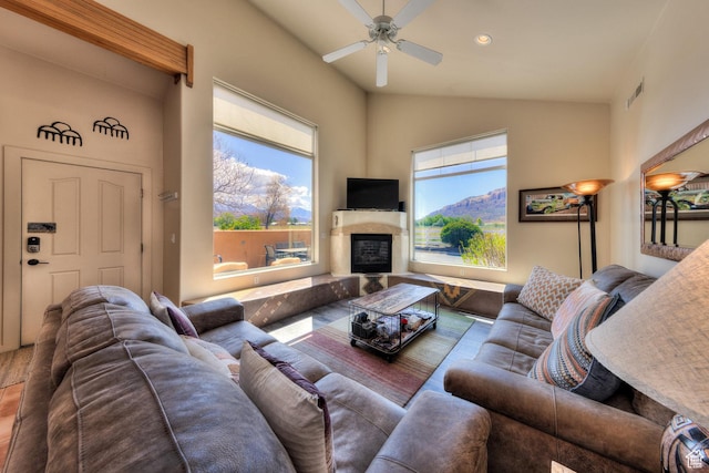 3686 S Spanish Valley Dr Unit K-2, Moab, UT 84532 - living area featuring lofted ceiling, recessed lighting, a glass covered fireplace, visible vents, and ceiling fan
