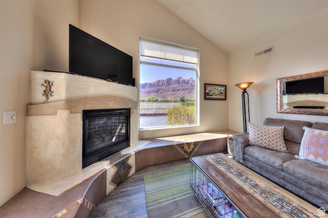 3686 S Spanish Valley Dr Unit K-2, Moab, UT 84532 - living room featuring a fireplace, visible vents, and high vaulted ceiling