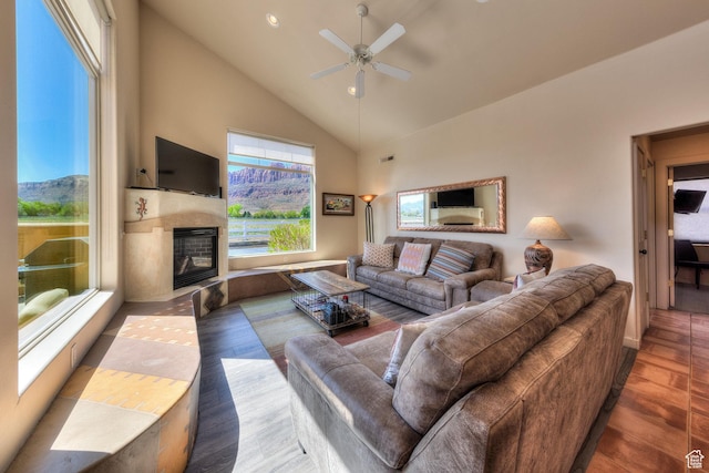 3686 S Spanish Valley Dr Unit K-2, Moab, UT 84532 - living area featuring ceiling fan, visible vents, a fireplace with flush hearth, high vaulted ceiling, and wood finished floors