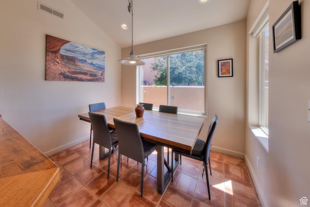 3686 S Spanish Valley Dr Unit K-2, Moab, UT 84532 - dining space featuring baseboards, lofted ceiling, light tile patterned floors, and visible vents