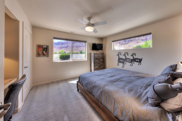 3686 S Spanish Valley Dr Unit K-2, Moab, UT 84532 - bedroom featuring a ceiling fan, carpet flooring, visible vents, and baseboards