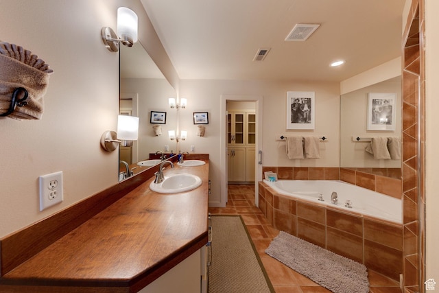 3686 S Spanish Valley Dr Unit K-2, Moab, UT 84532 - bathroom featuring a garden tub, visible vents, and a sink