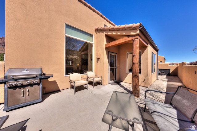 3686 S Spanish Valley Dr Unit K-2, Moab, UT 84532 - view of patio featuring fence and a grill