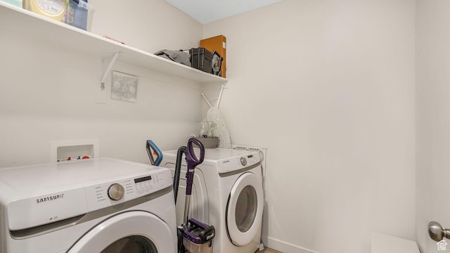 laundry area with laundry area and washer and dryer