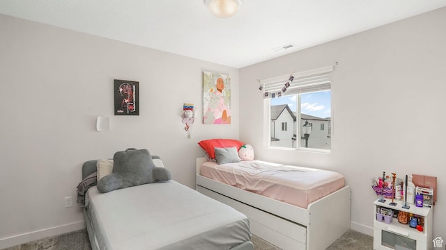 bedroom featuring carpet, visible vents, and baseboards