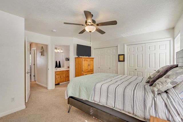 747 N 200 E, Springville, UT 84663 - bedroom featuring two closets, light carpet, baseboards, and ceiling fan