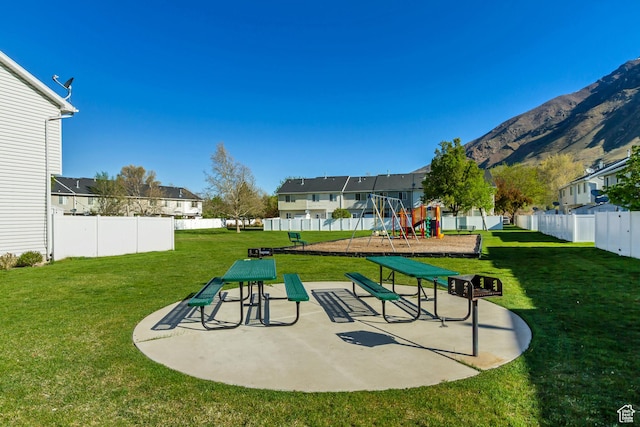 747 N 200 E, Springville, UT 84663 - view of property's community featuring fence, a mountain view, a residential view, a yard, and playground community