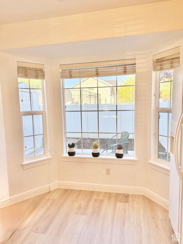 747 N 200 E, Springville, UT 84663 - spare room featuring light wood finished floors, baseboards, and a healthy amount of sunlight