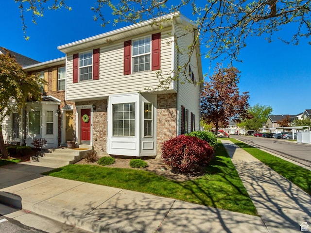 747 N 200 E, Springville, UT 84663 - view of front of house with brick siding and a residential view