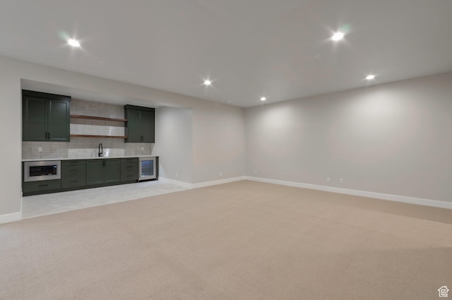 514 S 1450 W, Farmington, UT 84025 - unfurnished living room with wine cooler, light carpet, wet bar, baseboards, and recessed lighting